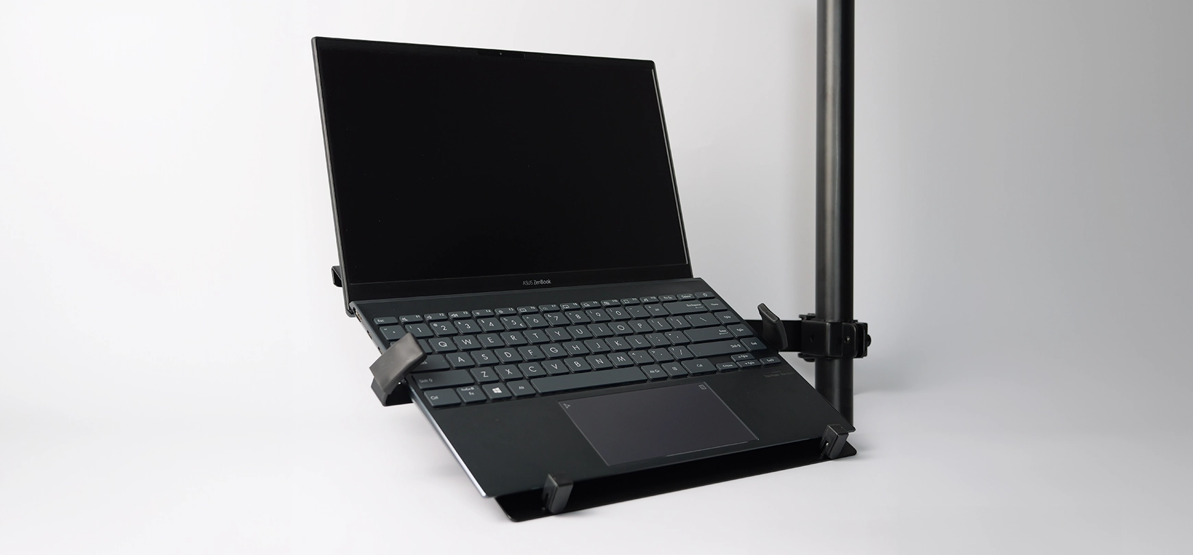 Monitor mount with an additional arm for a laptop